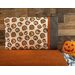 Halloween themed cream pillowcase featuring witches, jack-o-lanterns, and phrases with black banding featuring cream polka dots.