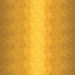 A mustard yellow ombre fabric with metallic accents.