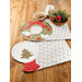 Two white placemats, one featuring a snow globe and the other, a wreath with doves and ribbon.