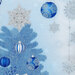Christmas tree and ornaments on blue