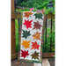 The finished Maple Leaf Runner draped over a railing outdoors