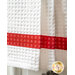 Waffle textured white towel with red 