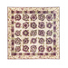 Cream quilt with flowers made of layered purple and green fabric.