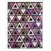 Purple and white quilt with triangle geometric design and floral prints.