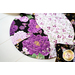 Braided twist being used as table runner on table set with plates and cloth napkins.