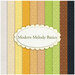 A collage of tonal fabrics included in the Modern Melody Basics FQ Set