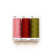 Three spools of Sulky 50 wt thread in the colors of pink, red, and olive.