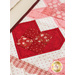 A close up of a pieced heart that is part of the Pint Size Table Runner - February