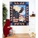 Red, white, and blue quilt featuring a central panel with two bald eagles and a United States Flag.