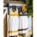 Hanging towel made of white bee themed fabrics with black and gold accents next to matching towel in white.