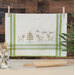 vintage kitchen towel with reindeer and a Christmas tree embroidery along with the phrase 