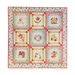 A quilt featuring nine patterned blocks with floral and animal motifs, bordered with colorful fabric.