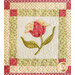 Quilt block featuring one large red flower.