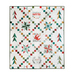 White quilt with lattice made of small squares and holiday motifs in between.