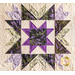 A quilt featuring a star pattern in purple and green, adorned with lavender floral motifs.