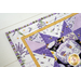 Table runner with geometric design with white and purple lavender and bee themed fabrics.