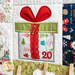 Close up of Patchwork quilt featuring Christmas themed motifs including a gift.