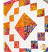 Quilt block with multicolor geometric design.