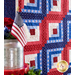 Americana themed quilt blocks with red, white, and blue star-filled fabrics.