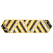 Table runner made of diagonal strips of bee themed fabrics in yellow, black, and white.