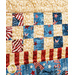 Quilted fabric featuring patriotic patterns with stars, stripes, and flags in red, white, and blue.