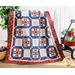 30 block quilt made of alternating blocks of geometric piecing and summer themed embroidery in red, white, and blue fabrics.