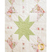 Quilt block with geometric square and triangle designs made of pastel color fabrics on white.