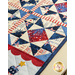 Pint Size Table Runner featuring geometric stars in red, white, and blue, along with star and firework appliqué at each end.