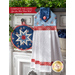 Hanging towel featuring a blue floral print and red and white plaid accents next to matching hot pad.