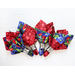 4 cloth napkins made of red and blue floral prints with silver napkin holders on a white background