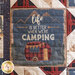 Quilt block featuring a camper and the phrase: 