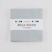 Solid gray Bella Solids charm pack isolated on a white background