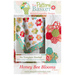 front cover of Honey Bee Blooms pattern with a photo of a finished quilt