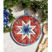 Round hot pad with central folded star design made of red and blue fabrics featuring paisleys.