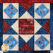 Stars and stripes quilt made of geometric blocks featuring red, blue, and cream, patriotic fabric prints.