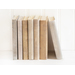 Seven books with fabric book covers against a white backdrop