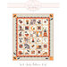 front cover of Spooky Halloween Quilt pattern showing a finished quilt in white, orange and black, each block with a different scene or character