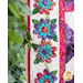 Colorful applique flowers on a white quilt border
