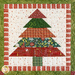 A close-up block of a Christmas tree in Christmas fabrics.
