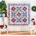 9 block geometric quilt made with red, White, and blue floral fabrics.