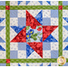 Block from geometric quilt made with red, White, and blue floral fabrics.
