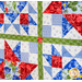 4 Blocks  from geometric quilt made with red, White, and blue floral fabrics.