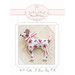 front of pattern booklet featuring a finished dog toy on a handwritten page.
