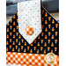 Black, orange, and white hanging towel with candy corn print and orange gingham.