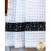 White waffle textured towel with tonal black banding.