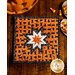 Orange Halloween themed hot pad featuring black cats along with black and white accent fabrics.