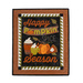 An autumn themed wool wall hanging with applique words, pumpkins, and coffee cups on a white background
