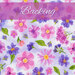 Close up of backing fabric pattern: mottled purple watercolor styled flowers tossed all over