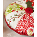 Red, green, and white, pincushion made of Christmas themed fabrics, accented with red button and holly leaf appliqué