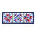 A red, white and blue floral table runner flat on a white background
